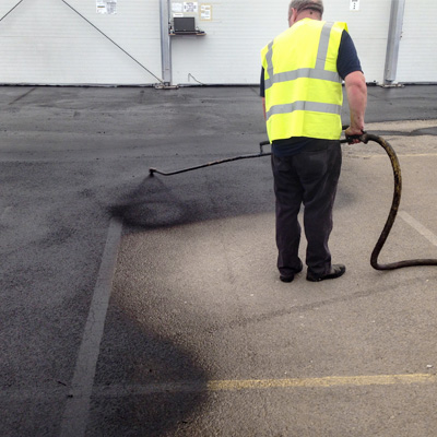 ASPHALT SEALCOATING